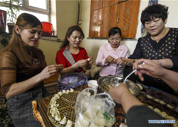 Dellers of Shubaigou Village Paint Doors as Celebration to U