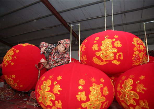 Village Hard at Work Making Spring Festival Lanterns